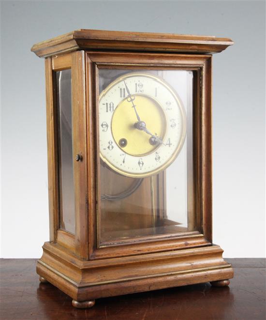 An early 20th century French walnut four glass mantel clock, 11.75in.